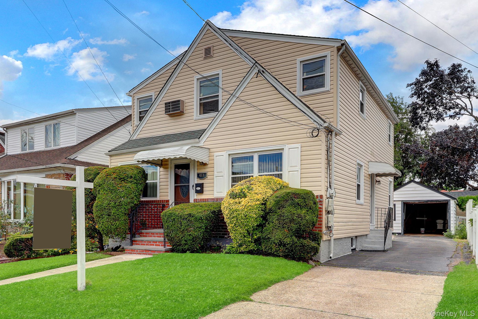Biji Thomas | ZI Realty LLC in New Hyde Park, NY | OneKey® MLS